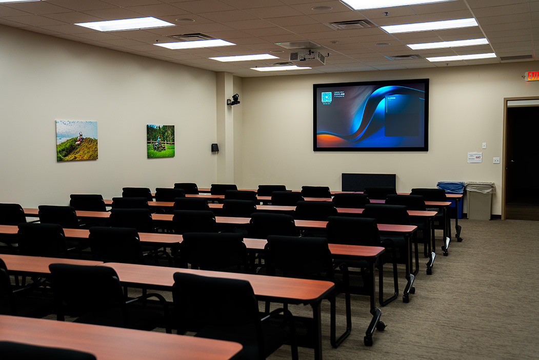 A wide shot of a conference room utilizing a Microsoft Teams Room